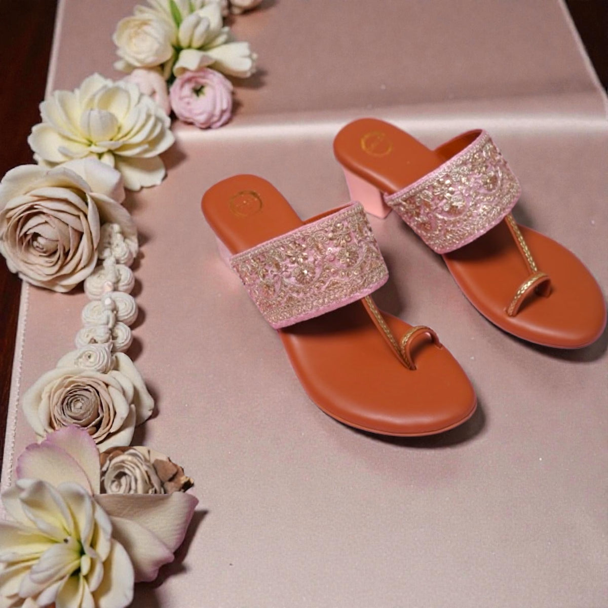 Pair of pink and silver sandals 
